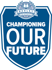 Image is of the blue and white shield logo of Bexley Schools that says Championing Our Future